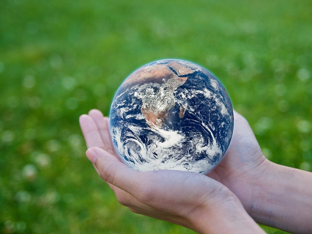 Earth globe in hands