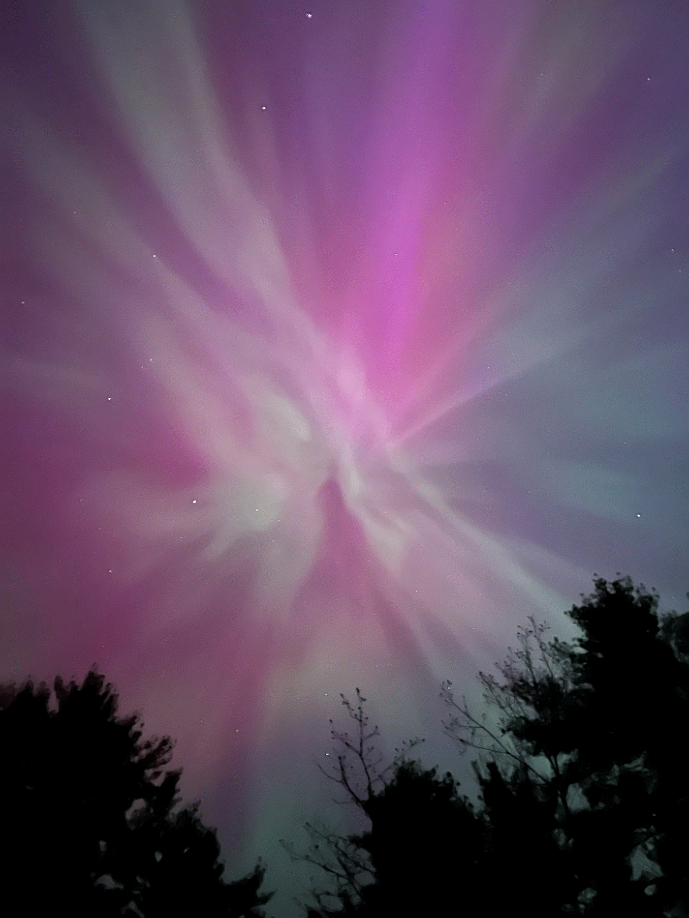 pink night sky from aurora borealis