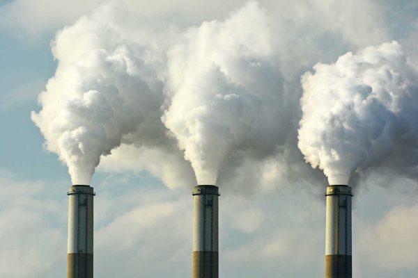 smoke billowing out of smokestacks