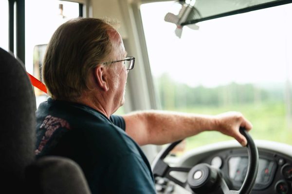 man driving bus