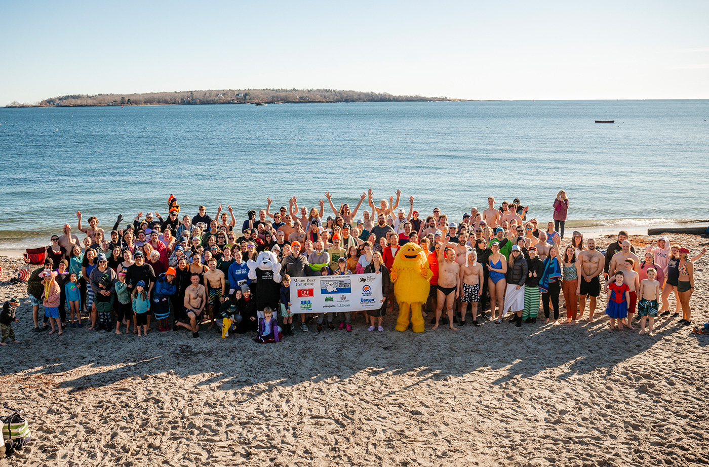 group of polar dippers with NRCM sign at Willard Beach