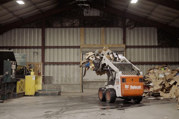 machine moving materials to be recycled