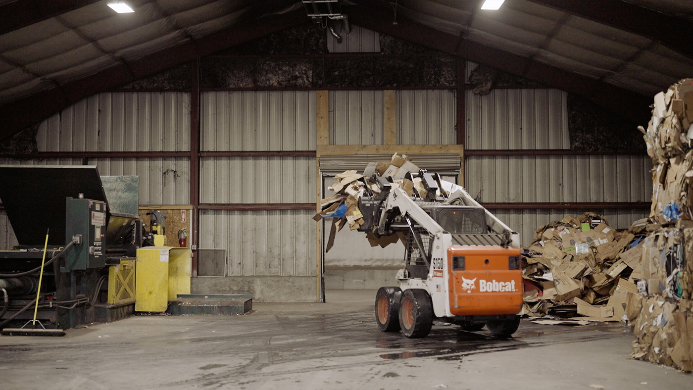 machine moving materials to be recycled